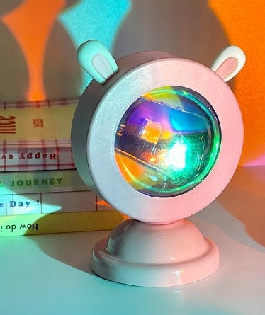 Sateenkaari-projektori söpöillä pupunkorvilla