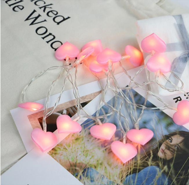 Vaaleanpunainen sydän valoketju lastenhuoneeseen