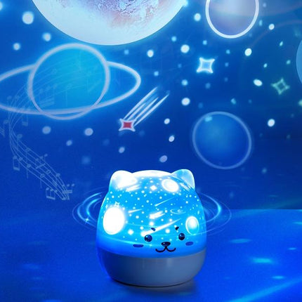 Kissa-yövalo projektorilla ja musiikilla