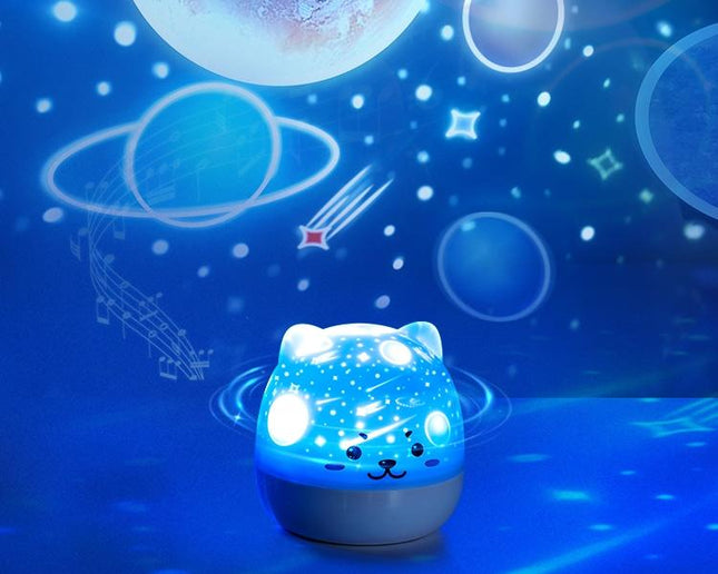 Kissa-yövalo projektorilla ja musiikilla