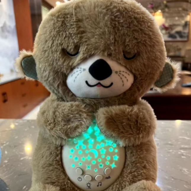 Nukkuva saukko pehmolelu yövalolla