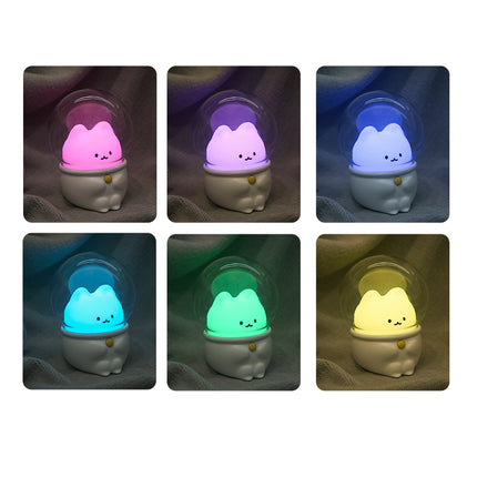 Pieni astronautti-pupu yövalo kapselissa