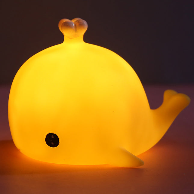 Pieni paristokäyttöinen valas-yövalo