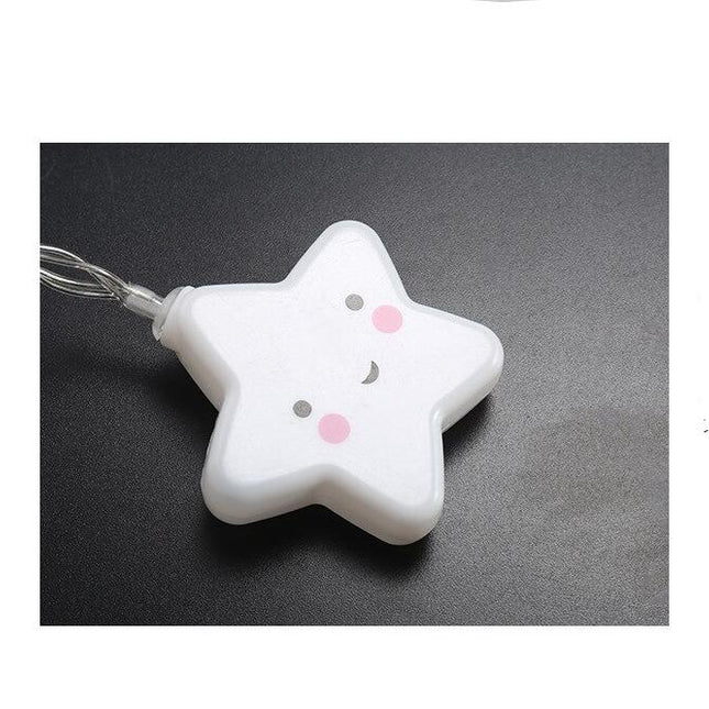 Valkoinen LED-valosarja hymyilevillä tähdillä