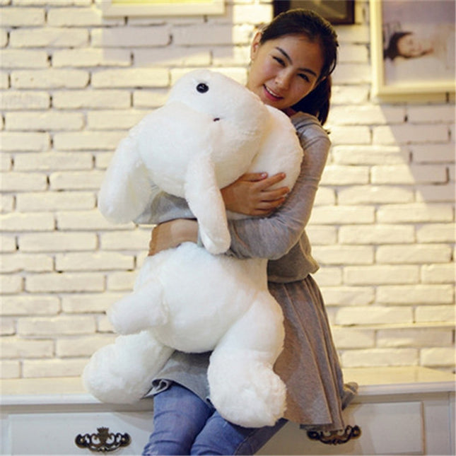 Valaiseva LED-pehmolelukoira yövalona lapselle