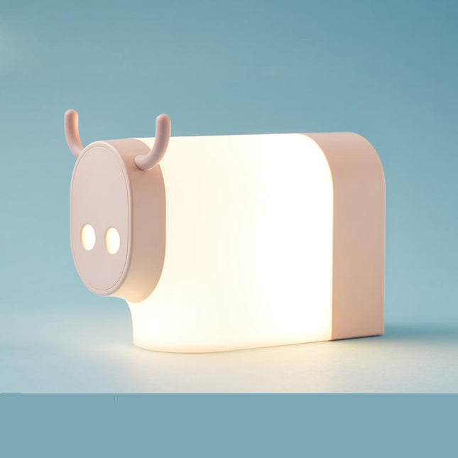 Lehmän muotoinen yövalo lapsille