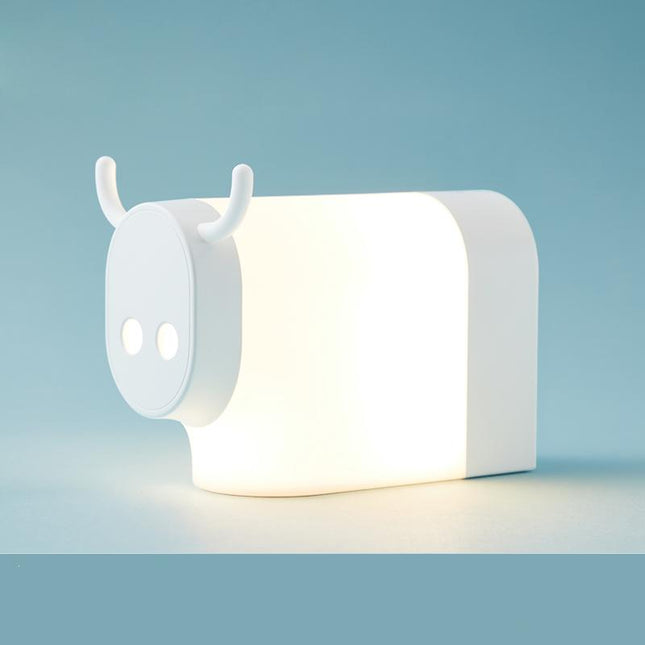 Lehmän muotoinen yövalo lapsille