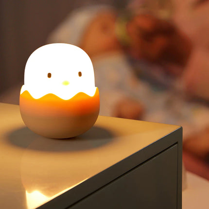 Silikoninen tipu-yövalo pehmeällä valolla lapselle