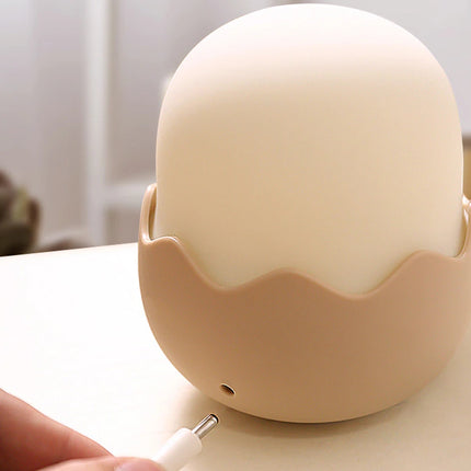 Silikoninen tipu-yövalo pehmeällä valolla lapselle