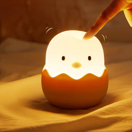 Silikoninen tipu-yövalo pehmeällä valolla lapselle